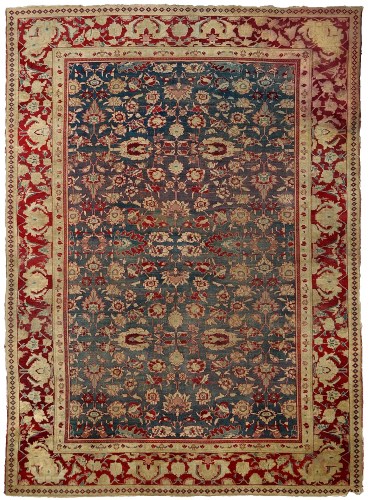 Lot 1235 - An Agra carpet, the field with blue ground and...