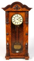 Lot 1272 - A Viennese walnut veneered wall clock with...