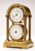 Lot 1274 - A brass clock/aneroid barometer compendium,...