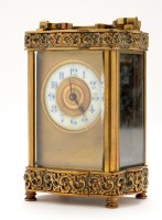 Lot 1277 - A 19th Century brass carriage clock, with part...