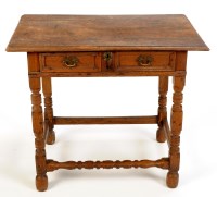 Lot 1305 - An 18th Century elm table, fitted two frieze...