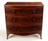 Lot 1378 - A late Georgian mahogany bowfront chest of two...