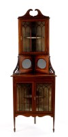 Lot 1389 - An Edwardian inlaid mahogany standing corner...