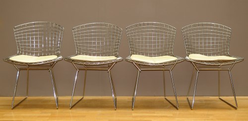 Lot 55 - A set of four Harry Bertoia side chairs,...