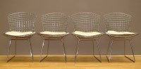 Lot 55A - A set of four Harry Bertoia side chairs,...