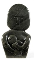 Lot 57 - Artist Unknown MOTHER AND CHILD carved green...