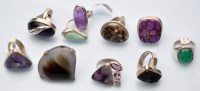 Lot 1088 - Ten gemstone set silver rings, including:...