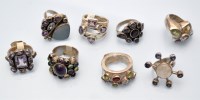 Lot 1091 - Eight gem set silver rings.