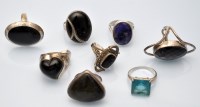 Lot 1096 - Eight single stone gem set rings including onyx.
