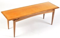 Lot 1121 - A 1970's teak coffee table, 115 x 40 x 42cms...