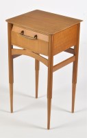 Lot 1130 - A 1980's teak bedside table, fitted a single...