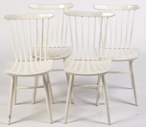 Lot 1150 - Ercol: four white painted spindle back dining...