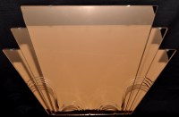 Lot 1211 - An Art Deco rose tinted wall mirror, 76 x...