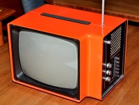 Lot 1213 - Apollo 3000: a television in orange plastic...