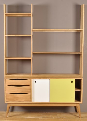 Lot 1220 - Nick James: an oak bookcase unit, fitted open...