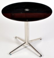 Lot 1226 - A Modena circular table, the black glass top...