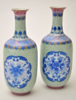 Lot 23 - Small pair of Chinese green ground vases,...