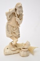 Lot 85 - Japanese carved ivory figure of a fisherman,...