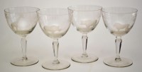 Lot 97 - Set of four engraved 'Big Game' wine glasses,...