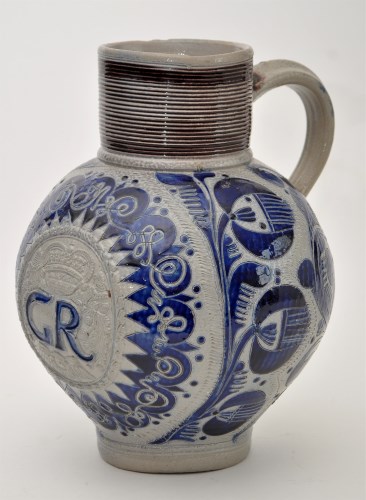 Lot 144 - German 'Westerwald' jug, part blue and...