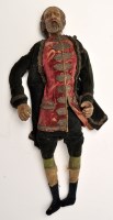Lot 292 - A 19th Century Continental male doll, wearing...