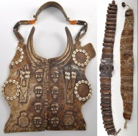 Lot 338 - A Naga Tribe carved bone and cowry shell...