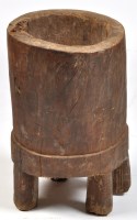 Lot 340 - A trunk pattern Naga Tribe rice pounder on...