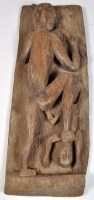 Lot 345 - A Naga Tribe morung carved wooden panel...