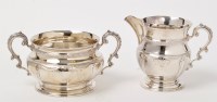 Lot 409 - A George V silver sugar bowl and milk jug, by...