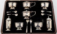 Lot 429 - A George V silver condiment set, by William...