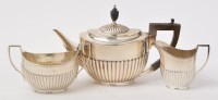 Lot 441 - A George V silver three-piece tea service, by...