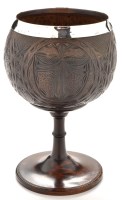 Lot 475 - A 19th Century carved coconut cup, decorated...