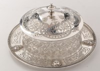 Lot 477 - A Victorian cut glass butter dish with silver...