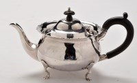 Lot 480 - An Edwardian silver teapot, by Nathan & Hayes,...