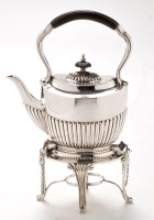 Lot 513 - A George V silver tea kettle on stand, by...