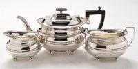 Lot 532 - A George V silver three-piece tea service, by...