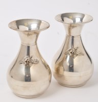 Lot 569 - A pair of Egyptian silver vases, baluster...