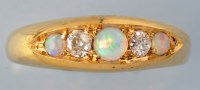 Lot 652 - A late 19th Century diamond and opal ring, the...