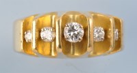 Lot 653 - A five stone diamond ring, the graduated...