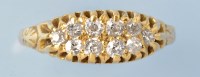 Lot 675 - A diamond ring, set with ten old cut diamonds,...