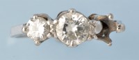 Lot 691 - A diamond ring, the central brilliant cut...