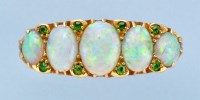 Lot 693 - An early 20th Century opal ring, the five...