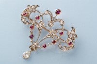 Lot 706 - An Edwardian ruby and diamond belle epoque...