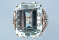 Lot 708 - An aquamarine ring, the emerald-cut aquamarine...