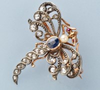 Lot 709 - A diamond, sapphire, ruby and seed pearl...