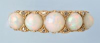 Lot 717 - An opal and diamond ring, the graduated...