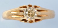 Lot 723 - A solitaire diamond ring, the old cut diamond...