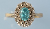 Lot 725 - A zircon and diamond ring, the oval facet cut...