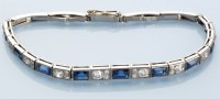 Lot 739 - A sapphire and diamond bracelet, the nine...