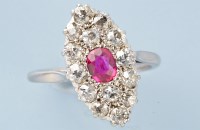 Lot 743 - A Victorian ruby and diamond cluster ring, the...